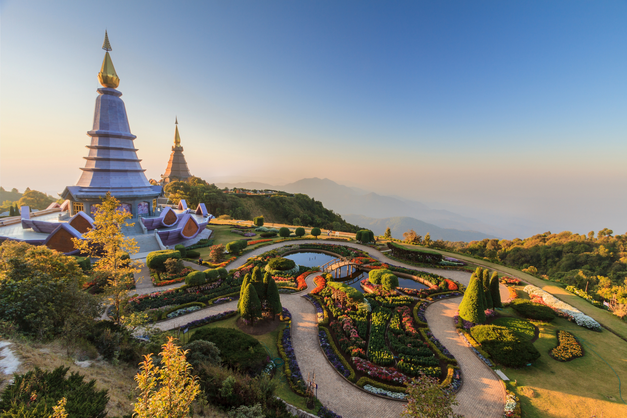 Lush green Thai landscape with a temple