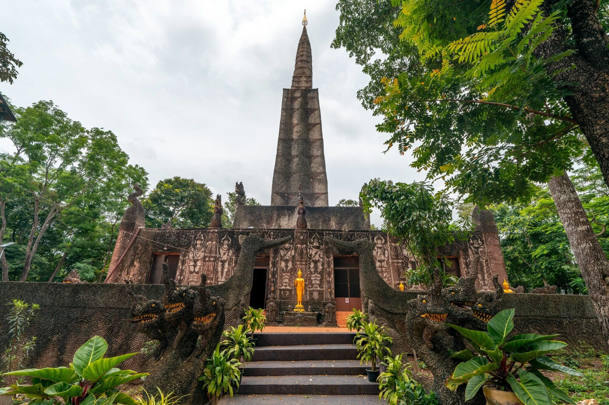 An ancient temple surrounded by trees.